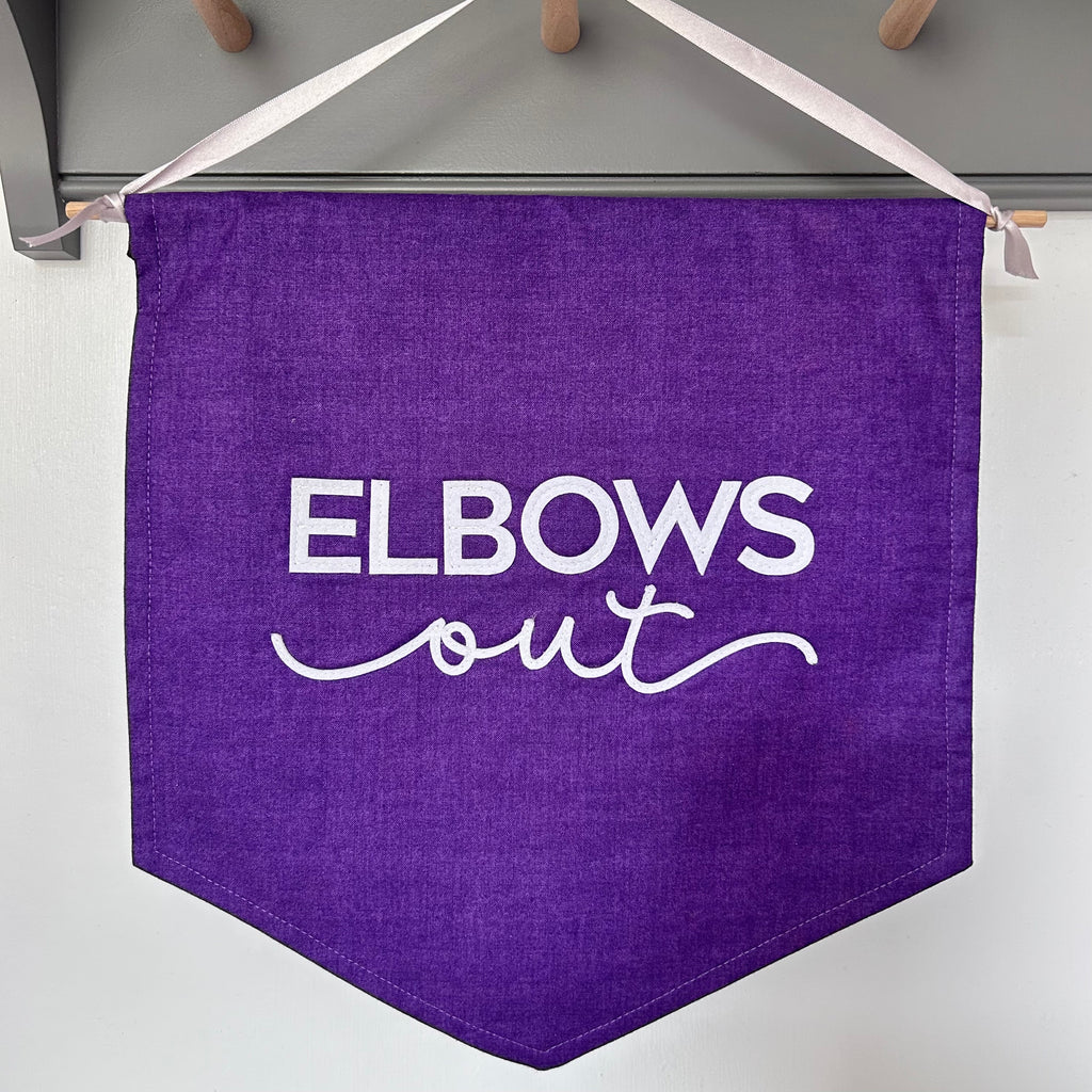 'Elbows Out' medium fabric banner